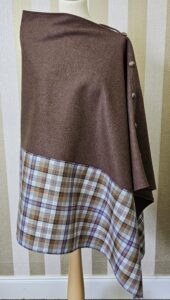 Banff Poncho A unique and stylish combination of tartan and tweed