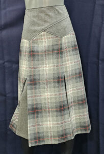 Defina The Defina takes the original Solga style of the 1920's to a classier level with contrasting waistband and kick pleats.