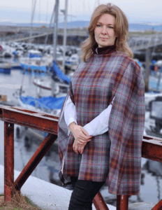 A beautiful three-quarter length Lambswool Tweed Cape with cotton velvet accents that coordinates perfectly with the Turriff Skirt and Waistcoat. Created in Scotland